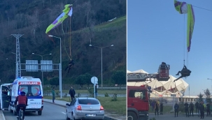 Paraşüt elektrik tellerine dolandı, havada asılı kaldı