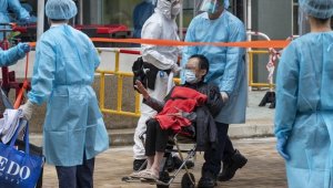 Pekin'de yaklaşık 1800 kişi karantina için toplu olarak komşu şehre gönderildi 