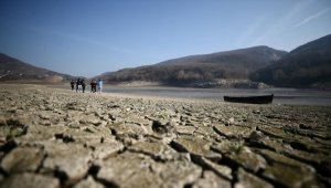 Milli sporcular suyun çekildiği baraj çevresinde farkındalık antrenmanı yaptı