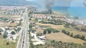 İzmir'de sazlık alanda çıkan yangın kontrol altına alındı