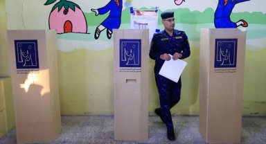 Irak'ta güvenlik güçleri ve iç göçmenler, yerel seçim için "erkenden" sandık başında