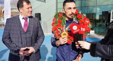 Avrupa Halter Şampiyonu Muammer Şahin, çiçek ve meşalelerle karşılandı